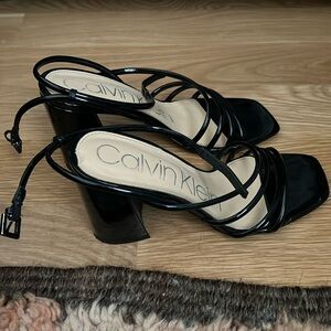 Calvin klein strappy black patent leather block heel square toe sandals. Size 7.